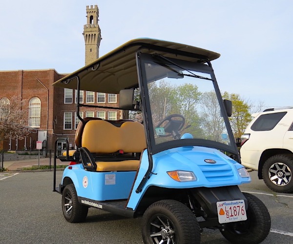Image of blue golf cart facing straight ahead